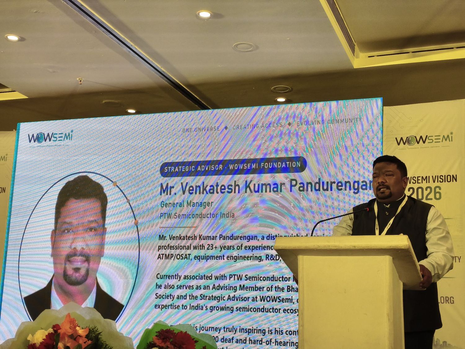Venkatesh Kumar Pandurengan on stage at WOWSemi Vision 2026